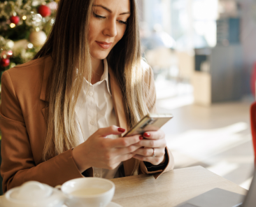 Business woman setting holiday hours on security system.