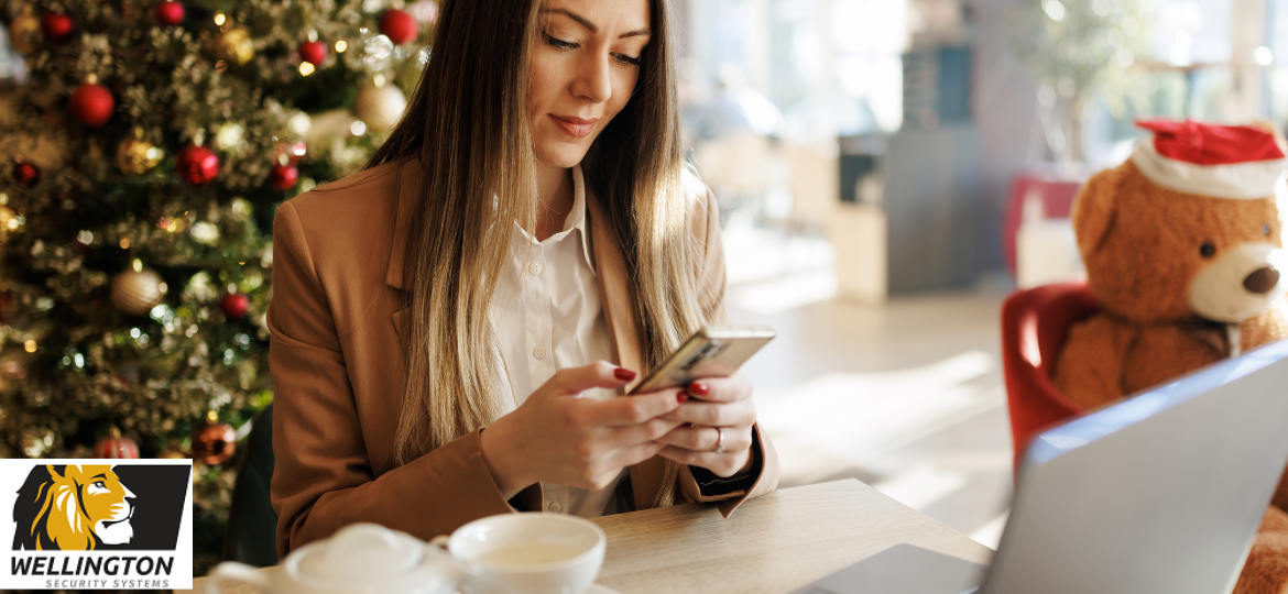 Business woman setting holiday hours on security system.